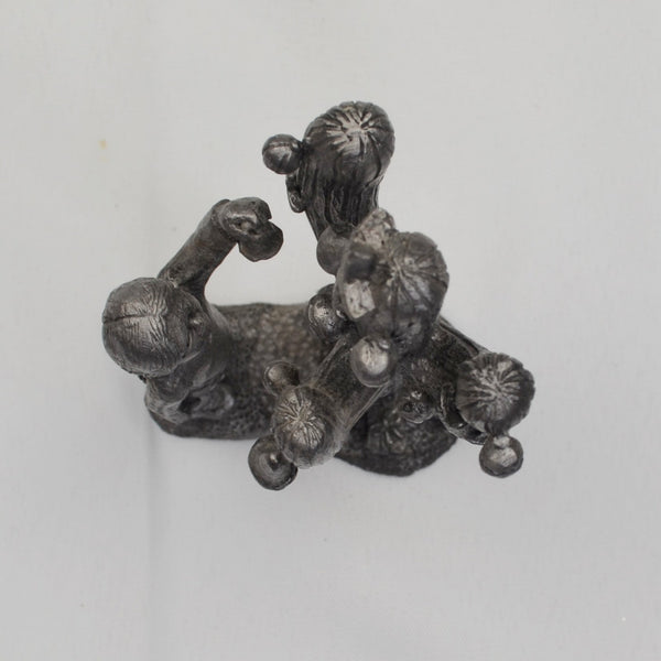 Pewter Girl Decorating Christmas Cactus Sculpture Figurine by M A Ricker 1982
