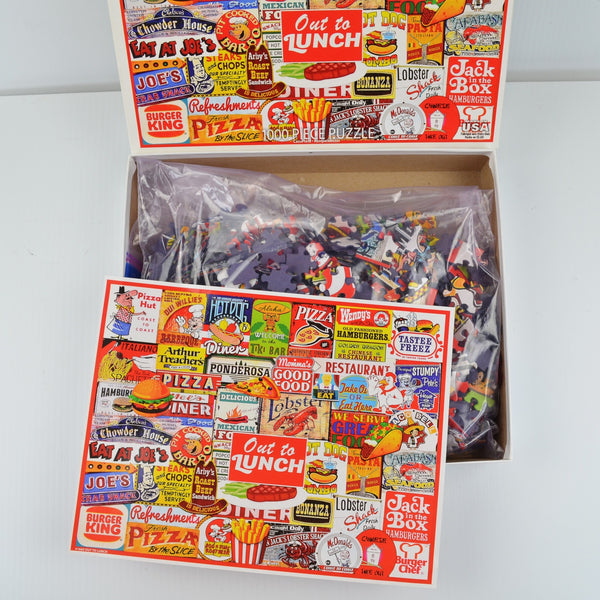 White Mountain Collage Puzzle - Out To Lunch - 1000 Piece Jigsaw Puzzle - 12+