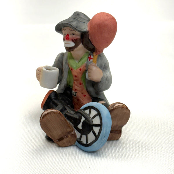 Emmett Kelly Jr Porcelain Clown Figurine Sitting with Unicycle