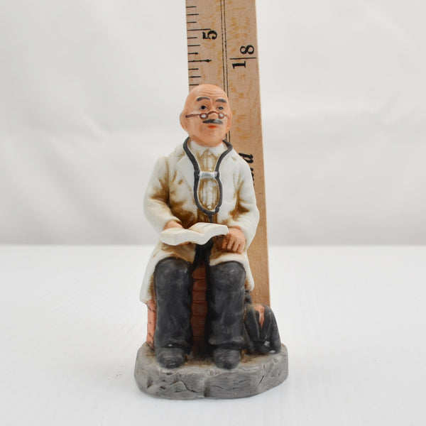 Vintage Ayerst Doctor Sitting Figurine - Medical Bag, Pharmacist Old Doctor Book