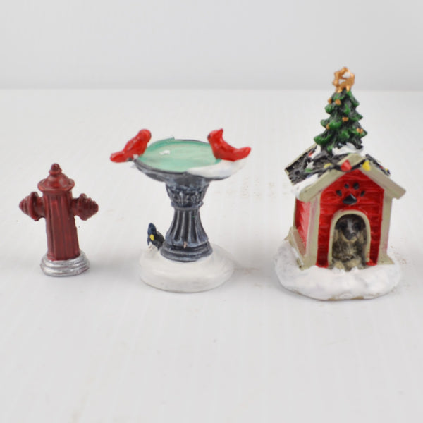 Lot of 17 Holiday Time Christmas Village Trees Figures Lamp People Santa Clock