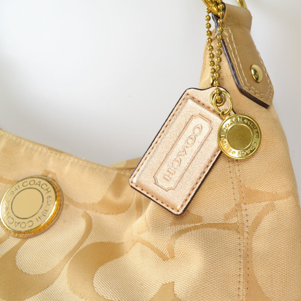 Coach Gold Cross-Body Bag • Designing Women Boutique - Sarasota, FL